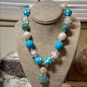 Chunky blue necklace with cute rhinestone pendant